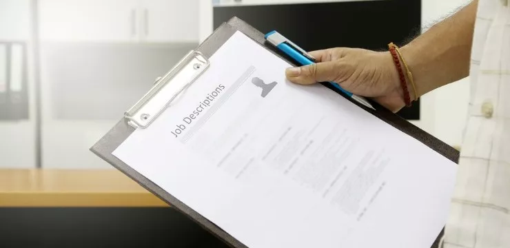 A Complete Change Management Sample Job Description (Plus Tips for Job Seekers)
